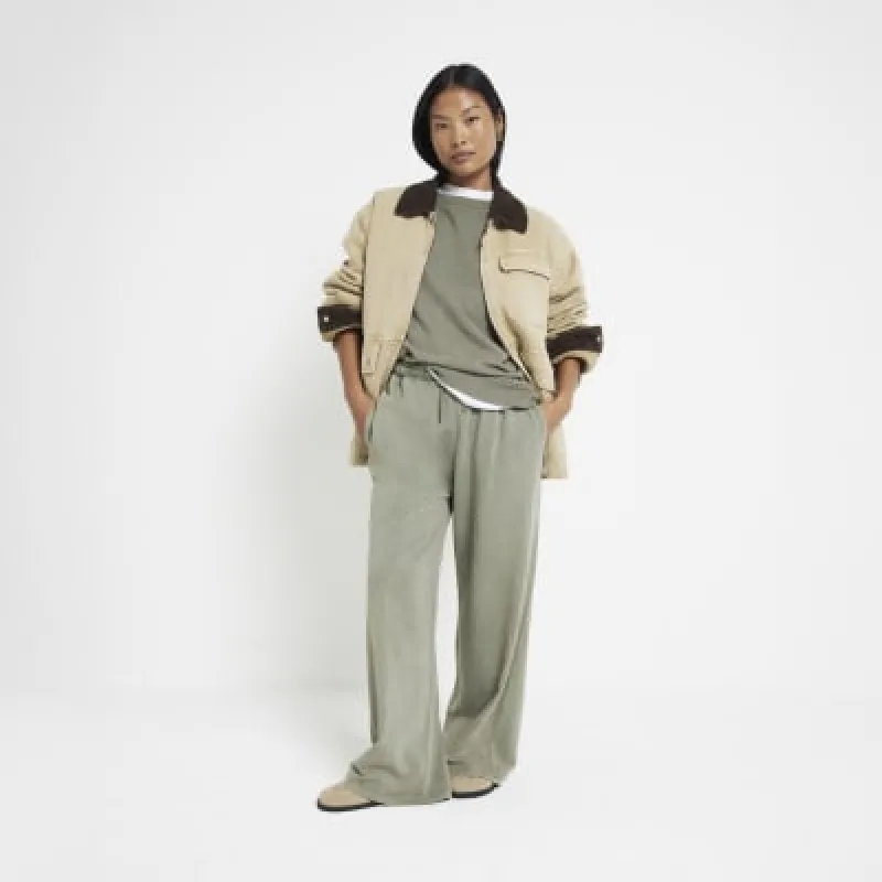 Petite Khaki Wide Leg Joggers sold by River Island