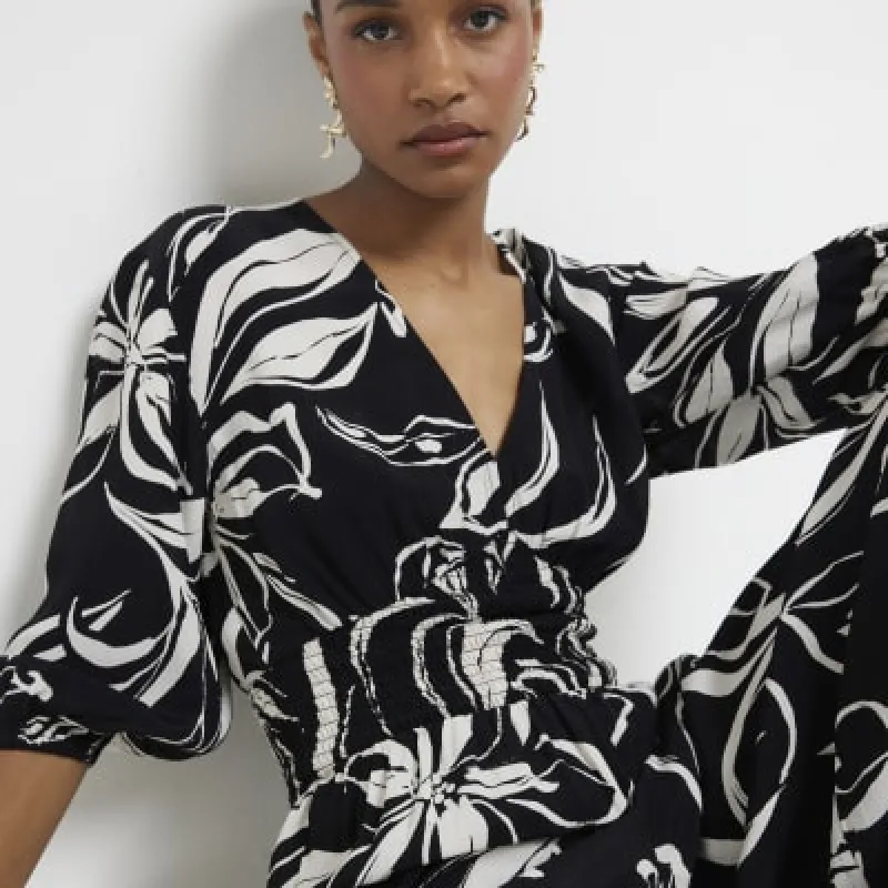 Black Floral print Jumpsuit made by River Island