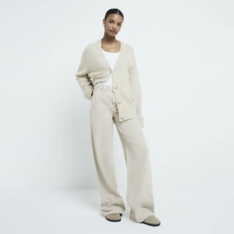 Cream Mid Rise Wide Leg jeans made by River Island