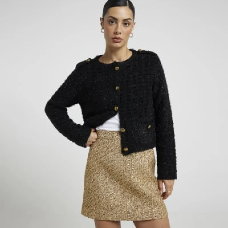 Gold Boucle Mini Skirt sold by River Island