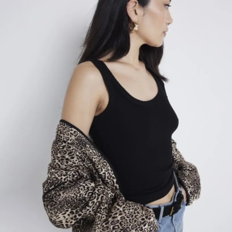 Black Ribbed Scoop Neck Vest Top sold by River Island