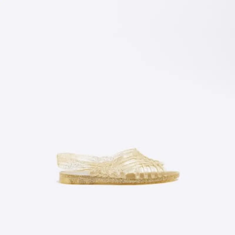 Gold strappy sling back jelly sandals sold by River Island