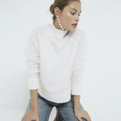 Cream Sequin Overlay High Neck Jumper sold by River Island