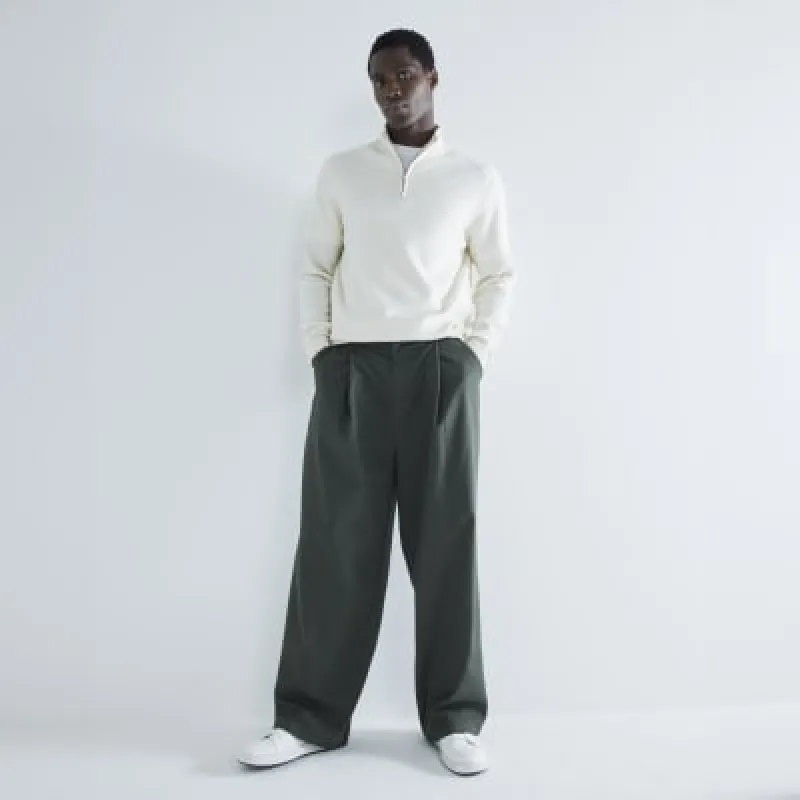 Beige slim fit waffle half zip jumper sold by River Island