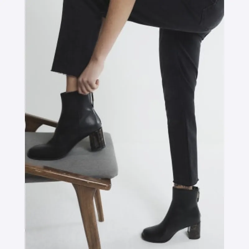 Black block heeled ankle boots sold by River Island