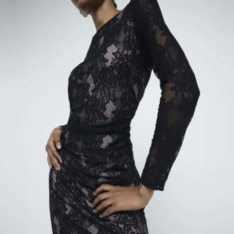 Black shoulder pad lace mini dress sold by River Island