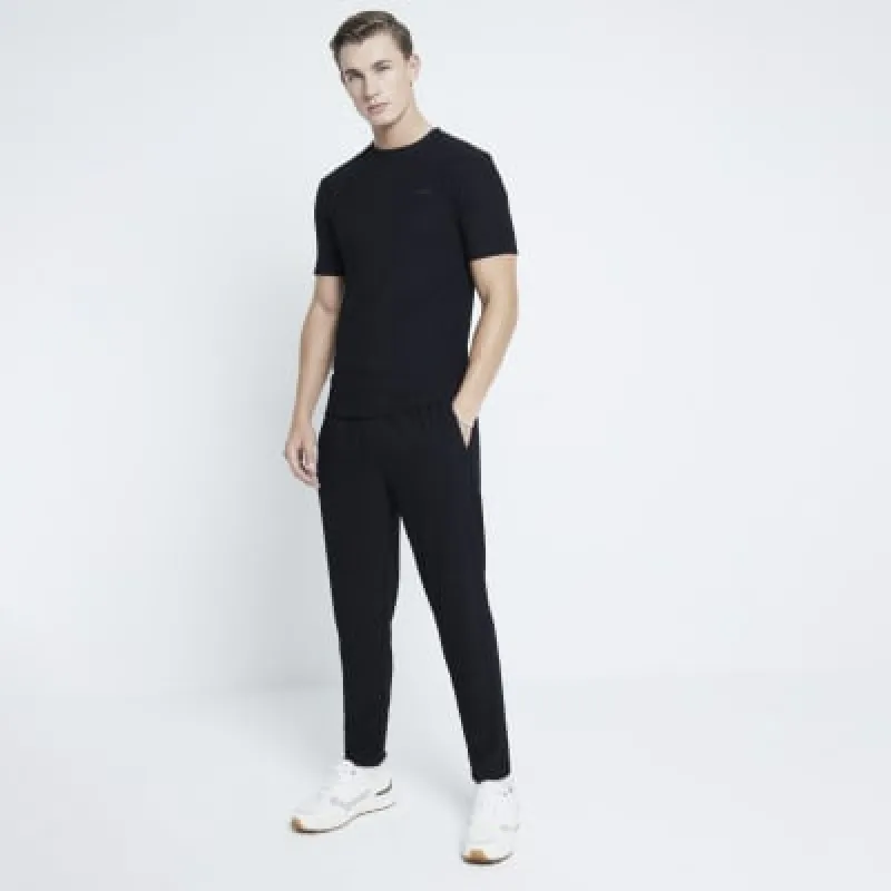Black Skinny Fit Ribbed Joggers sold by River Island