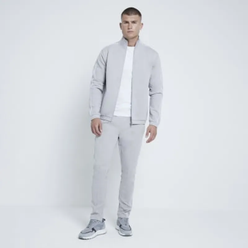 Stone Muscle fit Piped Funnel Jacket sold by River Island