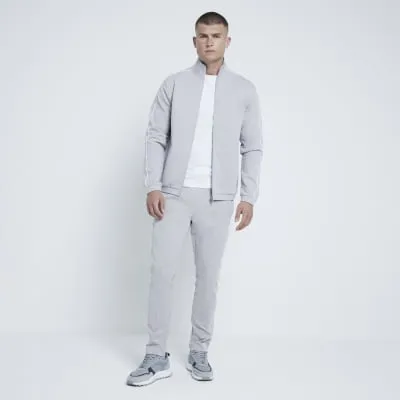 Stone Muscle fit Piped Funnel Jacket sold by River Island