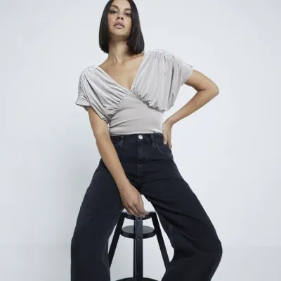 Stone Draped Plunged Neck Bodysuit sold by River Island