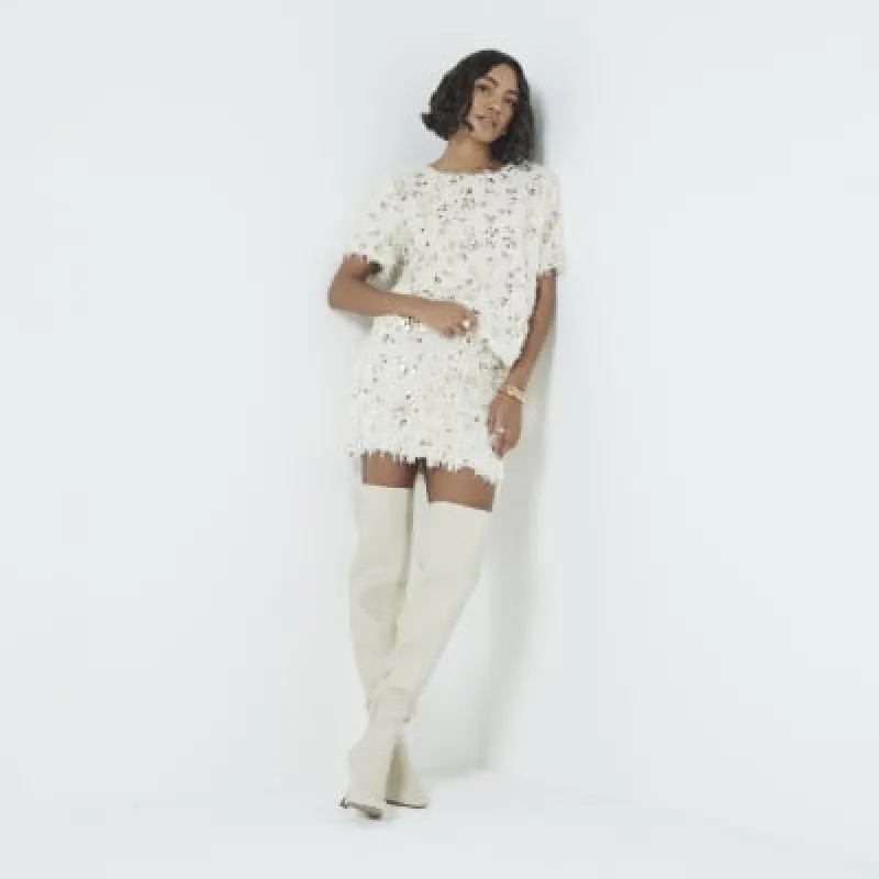 Cream Feather Sequin Mini Skirt sold by River Island