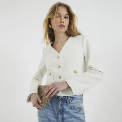 Cream Pocket Boucle Jacket sold by River Island