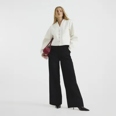 Black Wide Leg Pleated Trouser sold by River Island