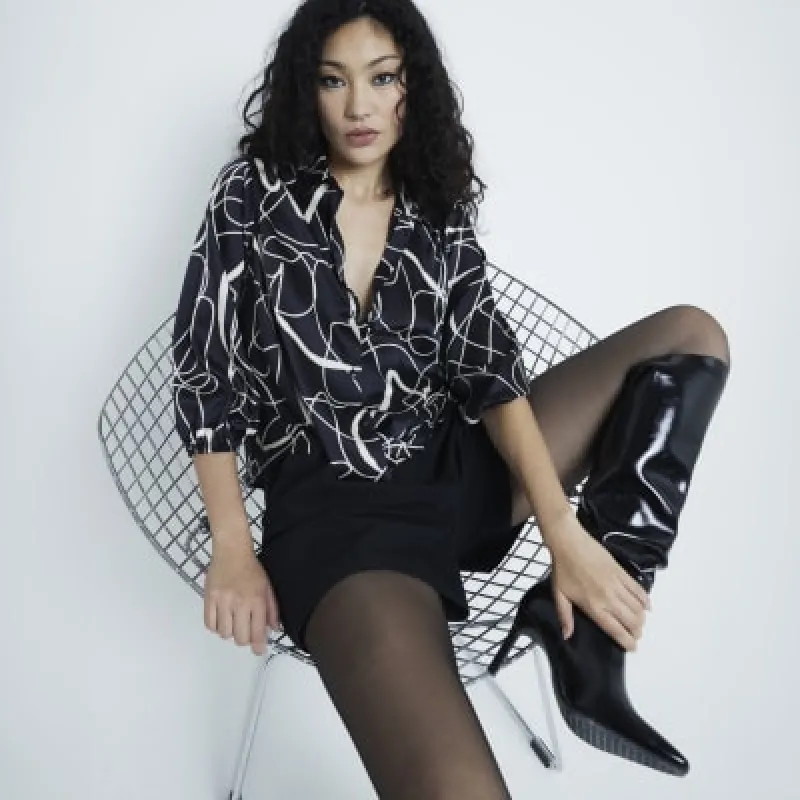 Black swirl print wrap shirt sold by River Island