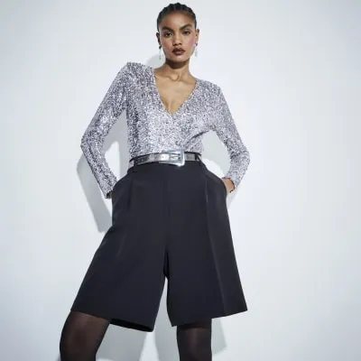 Purple Sequin Shoulder Pad Bodysuit sold by River Island