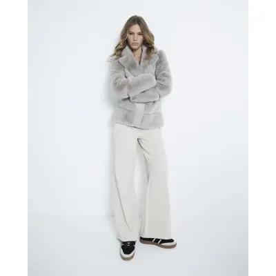 Stone Faux Fur Belted Biker Jacket sold by River Island