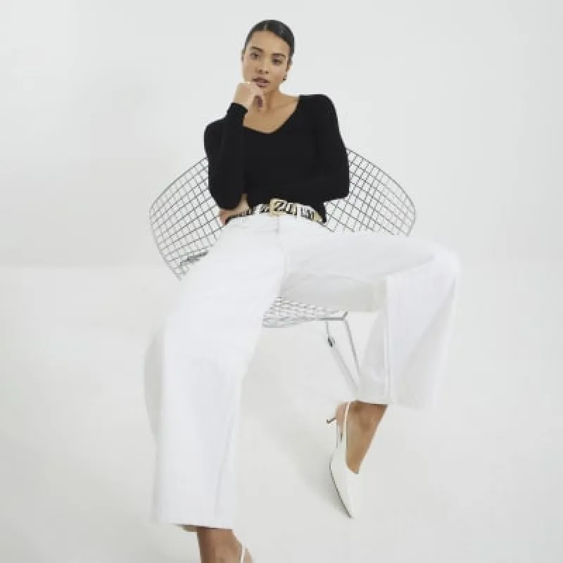 Black Long Sleeve V Neck Top sold by River Island
