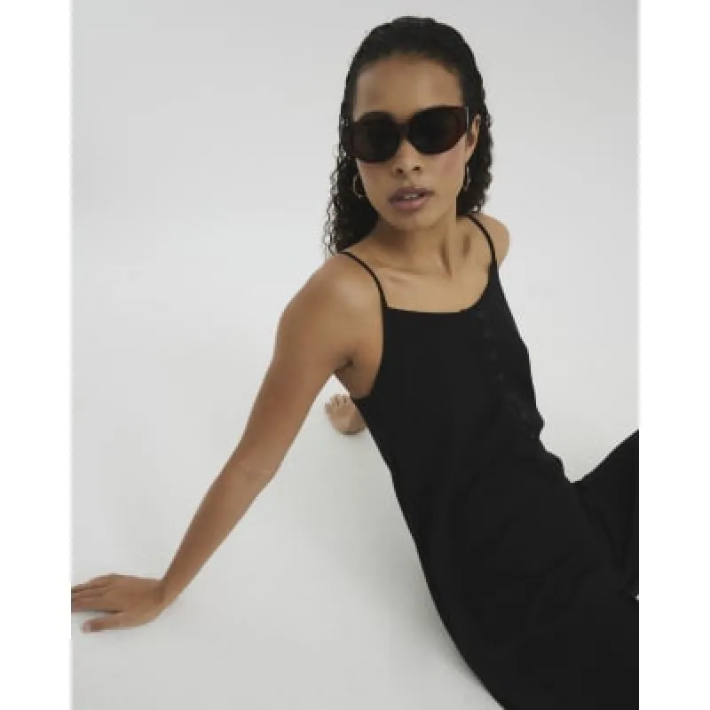 Black Lyocell Cami Jumspuit sold by River Island