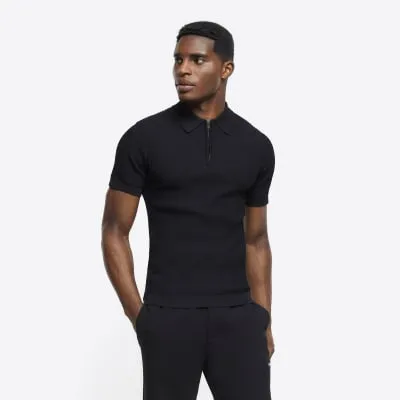 Black muscle fit knitted half zip polo sold by River Island