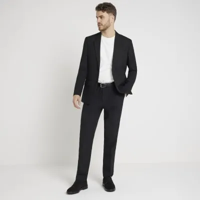 Black slim fit smart trousers sold by River Island