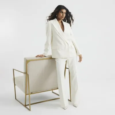 Petite Cream Slim Flared Trousers sold by River Island