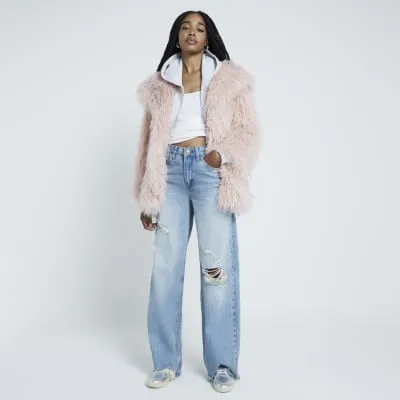Pink oversized faux fur jacket sold by River Island