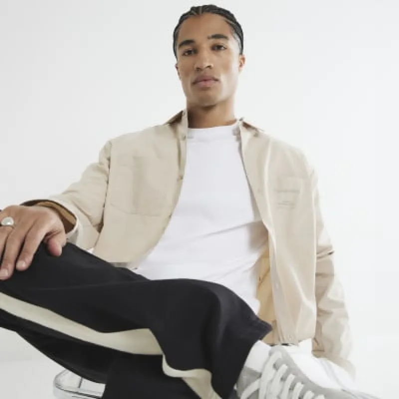 Stone Boxy Fit Poplin Graphic Shirt sold by River Island