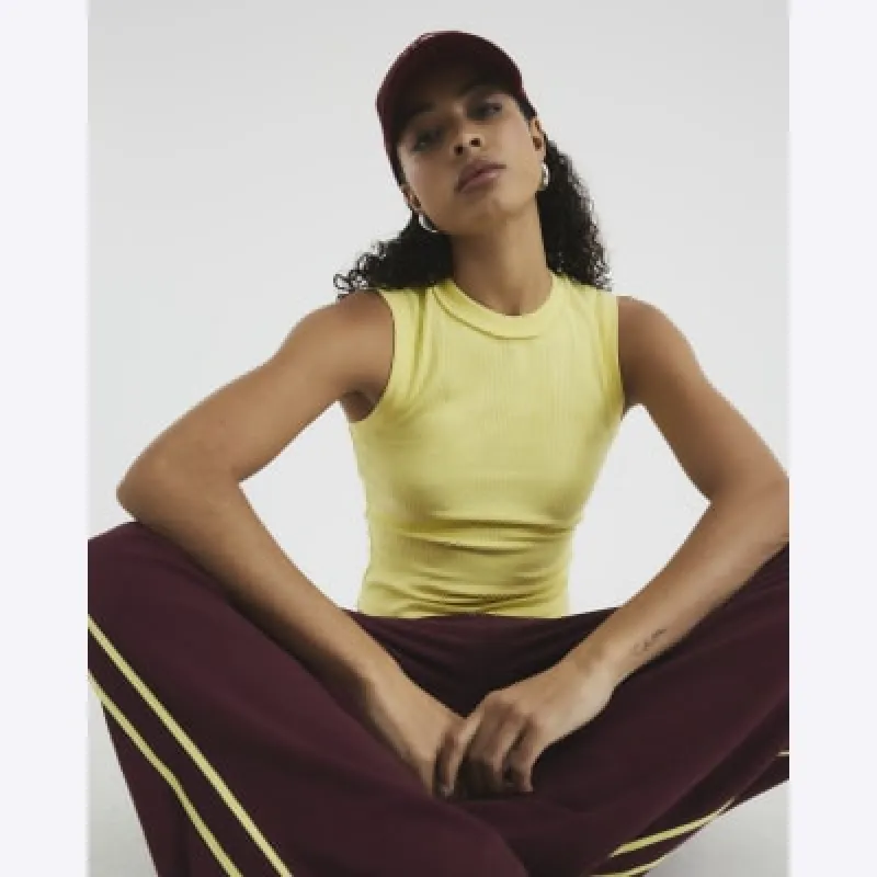 Yellow Sleeveless Ribbed Tank Top sold by River Island