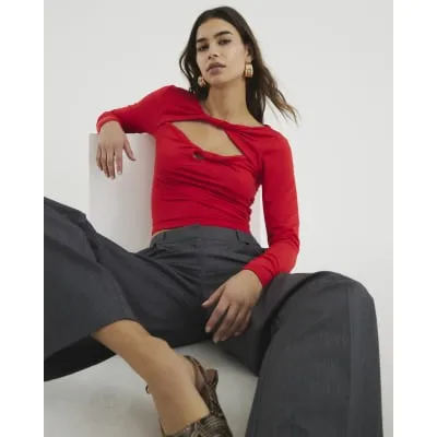 Red Long Sleeve Twist Cut Out Top sold by River Island