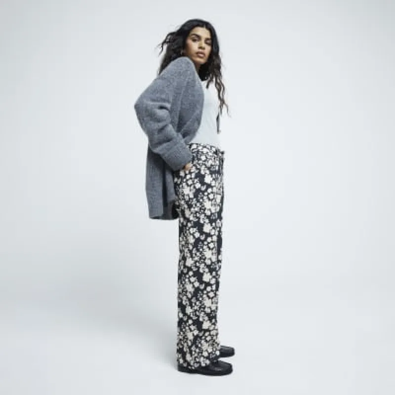 Petite Black Relaxed Straight Floral Jeans sold by River Island