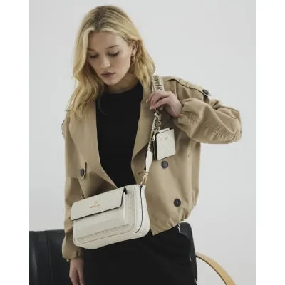 Cream RI Monogram Pouchette Cross Body Bag sold by River Island