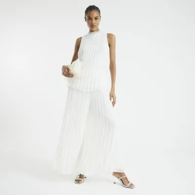 Cream Wide Leg Plisse Trousers sold by River Island