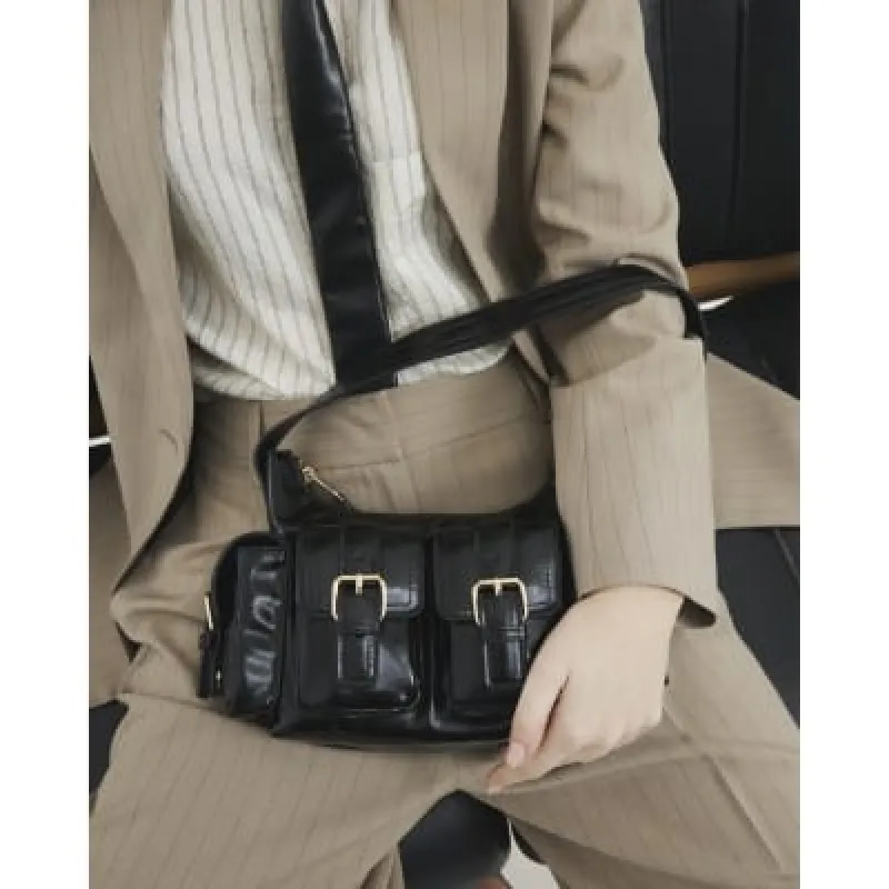 Black Buckle Pocket Utility Shoulder Bag sold by River Island