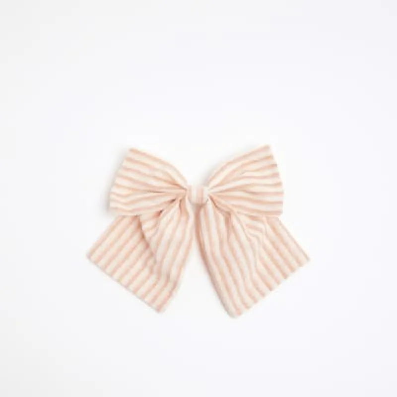 Orange Stripe Bow Hair Clip sold by River Island