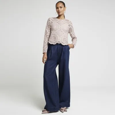 Beige lace long sleeve top sold by River Island