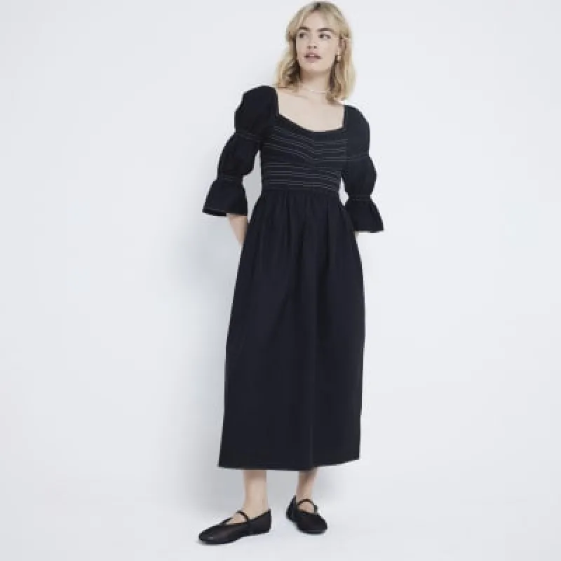 Black shirred smock midi dress sold by River Island