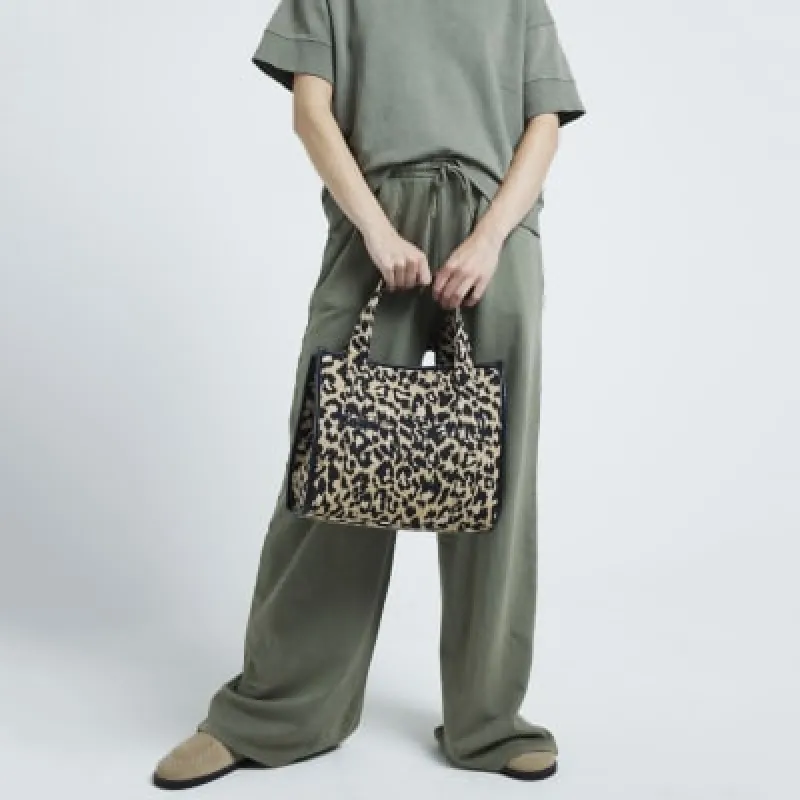 Beige jacquard leopard print tote bag sold by River Island