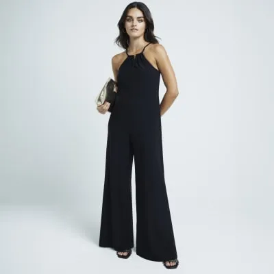 Black Wide Leg Slinky Jumpsuit sold by River Island