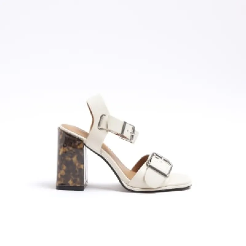 Cream buckle block heeled sandals sold by River Island