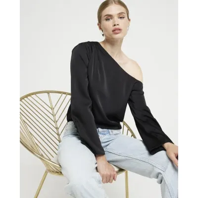 Black one shoulder cuffed blouse sold by River Island