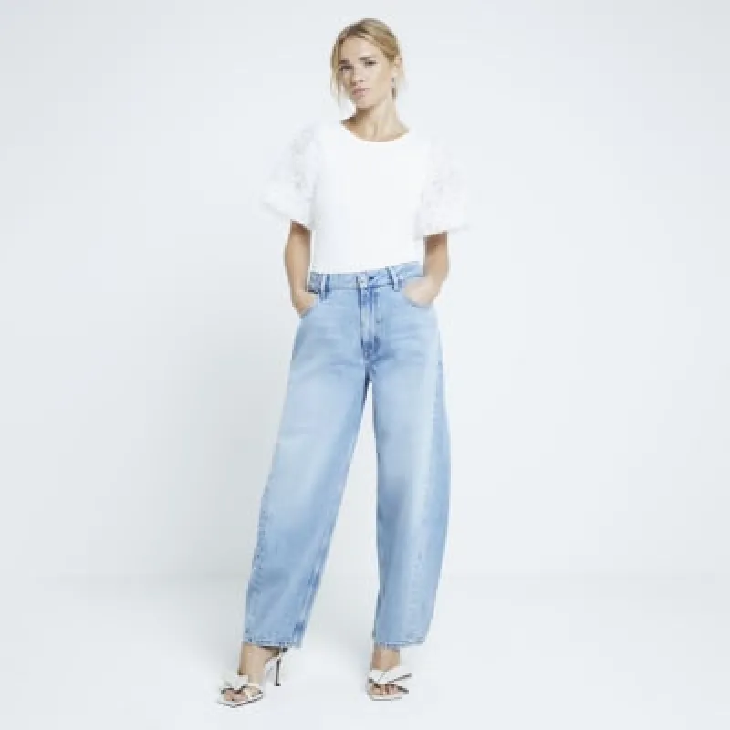 White lace puff sleeve bodysuit sold by River Island