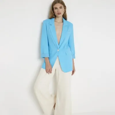 Blue roll sleeve blazer sold by River Island