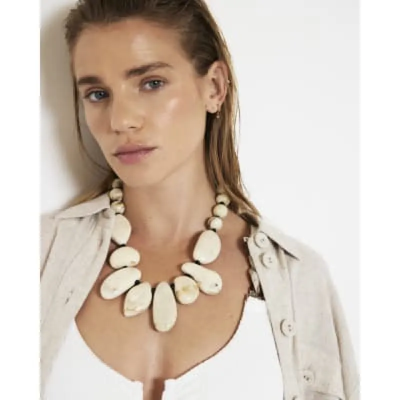 Cream Large Stones Necklace sold by River Island