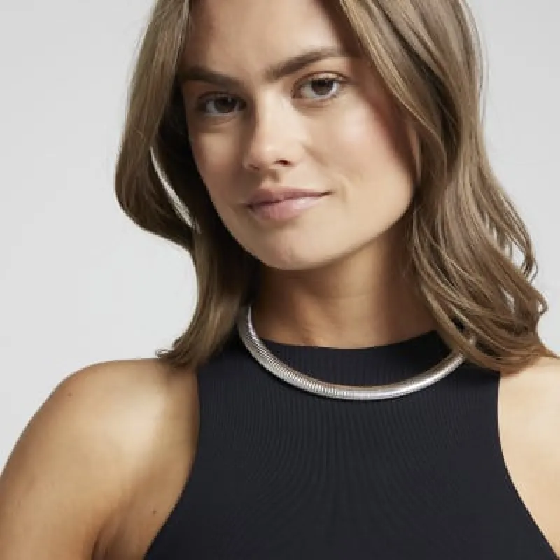 Silver watch strap necklace sold by River Island