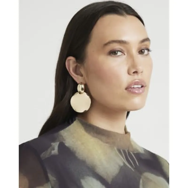 Gold disc drop earrings sold by River Island