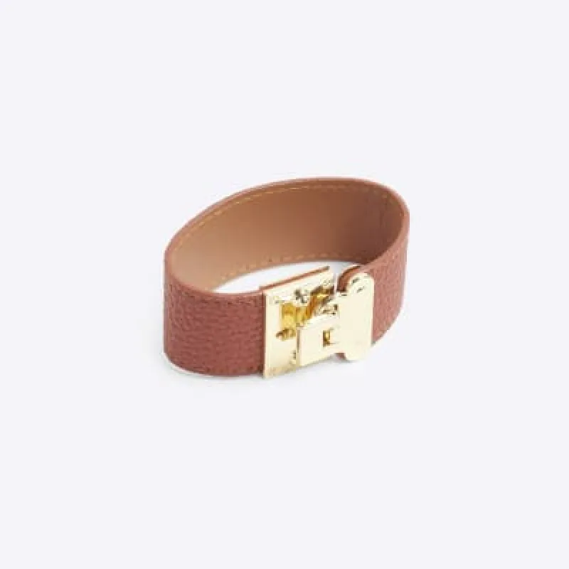 Brown lock clasp cuff bracelet sold by River Island