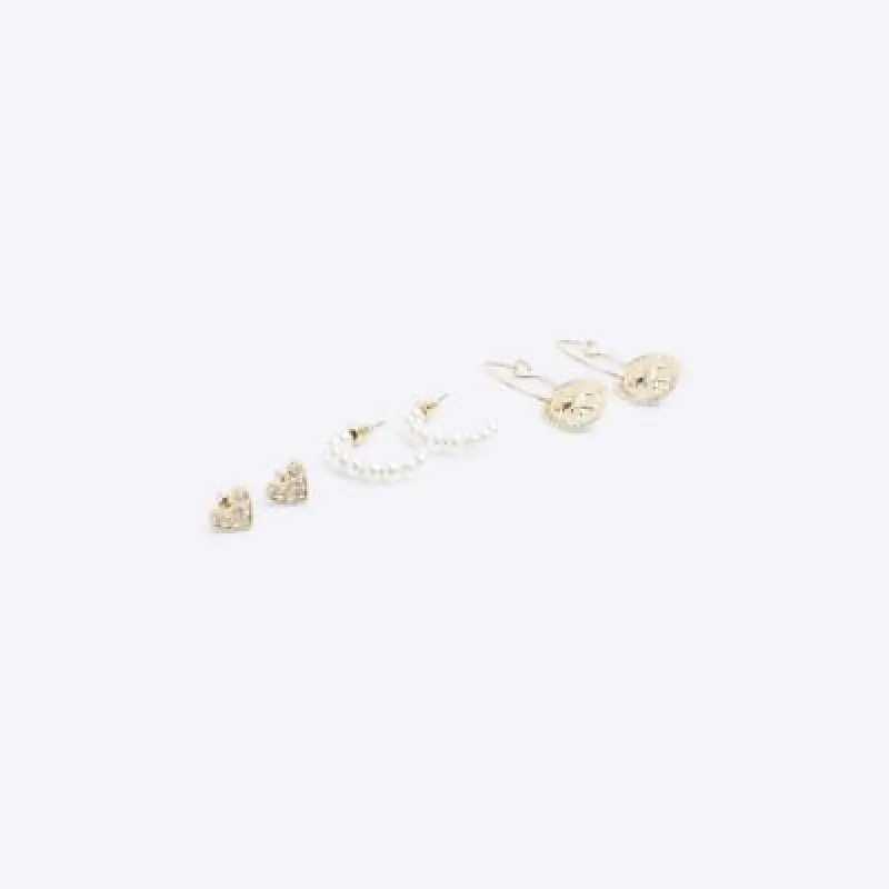 Gold pearl hoop and stud earrings multipack sold by River Island