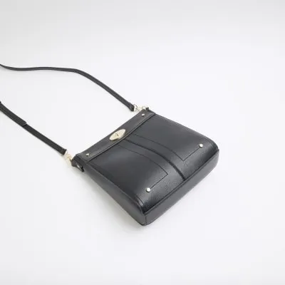 Black lock hardware cross body bag sold by River Island