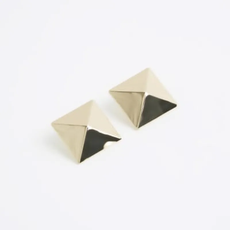 Gold pyramid stud earrings sold by River Island