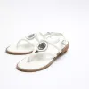 White studded flat sandals sold by River Island